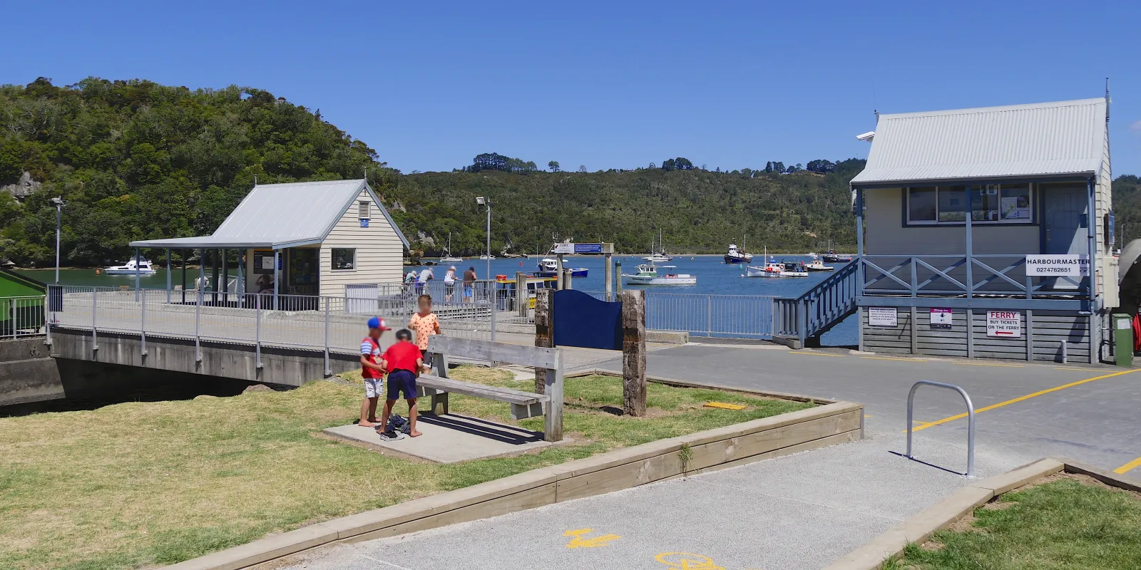 Small Whitianga passenger ferry crossing the harbour mouth to Ferry Landing in Mercury Bay