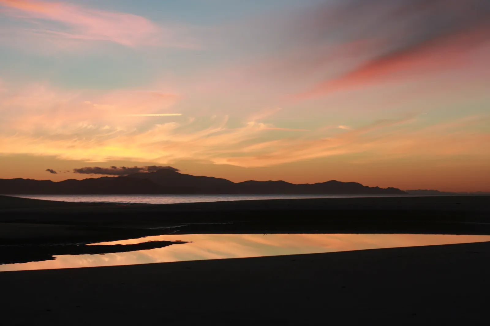 Ōtama Beach white sand and headlands on the Coromandel Peninsula, below Waimataruru