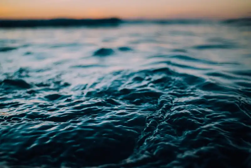 Ocean waves rippling along the New Zealand coastline